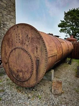 Old rusty steam engine boiler tank Stock Photos