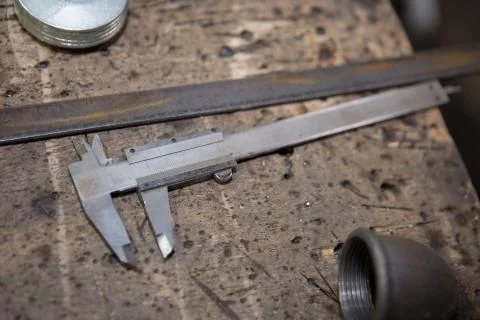 Old rusty tools and blanks on the table Stock Photos