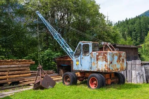 Old rusty tractor in a beautiful landscape. Heiligenblut . Hohe Tauern. Gro.. Stock Photos