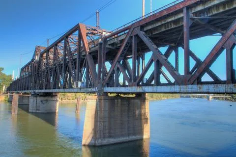Old rusty train bridge close Stock Photos