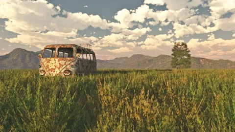 An old rusty van in a green meadow and floating clouds with mask Video stock 120463032
