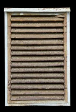 Old rusty ventilation's doors isolated on black background. Stock Photos