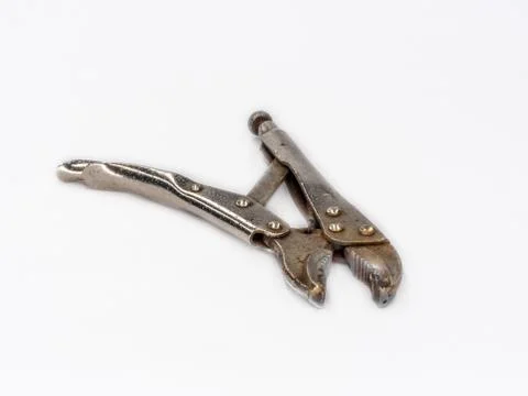 Old rusty Vise Grip Locking Pliers shot on white. Stock Photos