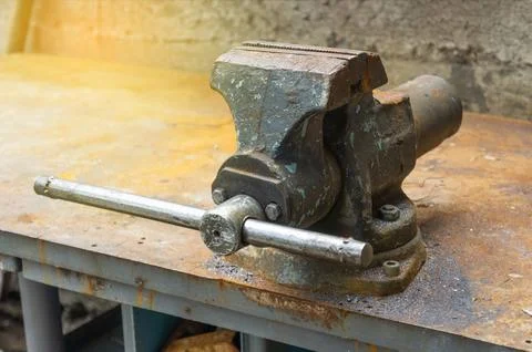 Old rusty vise grip on work old bench Stock Photos