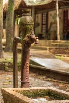 Old rusty water pump Stock Photos