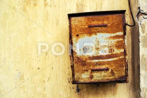 Old rusty weathered mailbox Stock Photos