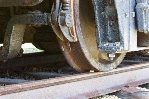 Old rusty wheels of a train and the railway Stock Photos
