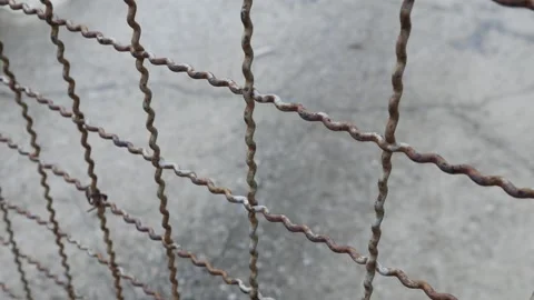 Old rusty wire mesh fence Stock Footage 319251189