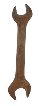 Old rusty wrench soviet-made isolated on white background. Stock Photos
