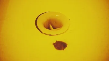 Old rusty yellow bath Stock Footage 86086657