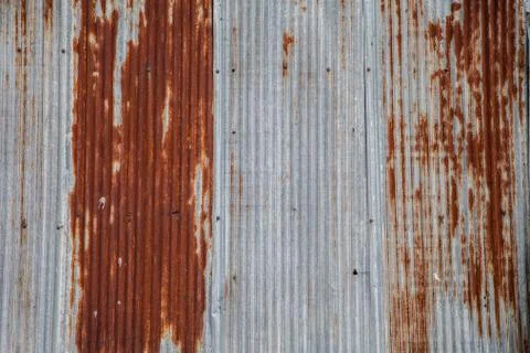 Old rusty zinc with road sign board. Stock Photos