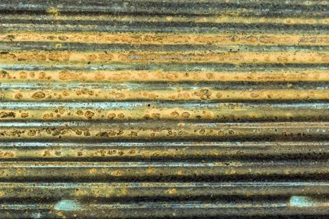 Old rusty zinc wall surface  galvanized, corrugated iron siding vintage textu Stock Photos