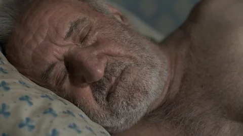 Old sad man wakes up Video stock 112064179