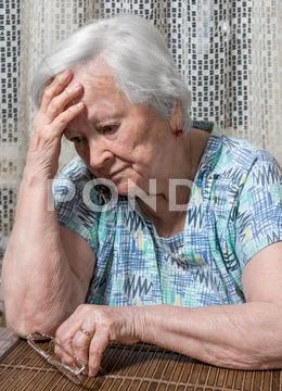 Old sad woman Stock Photos