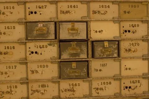 Old safe deposit boxes in the old vault of the Central Bank of Barcelona. Stock Photos