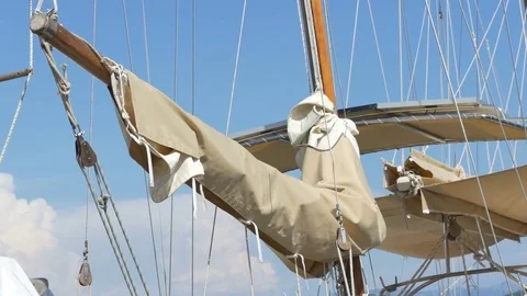 Old Sail Rolled on Mast Stock Footage 77357544