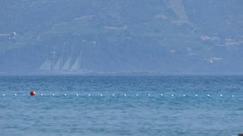 Old Sailboat  with Open Sails pssing  Sea Coast Stock Footage 53865595
