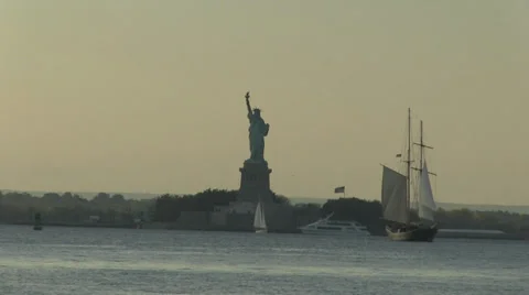 Old sailing ship and Statue of Liberty. Stock Footage 31741936