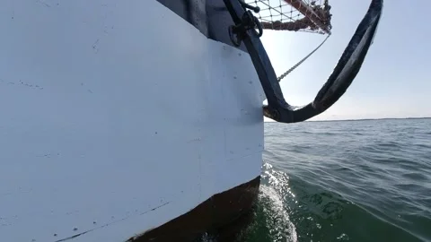 Old Sailing Ship with Bow Wave and Anchor in Summer - Front View Stock Footage 159760378