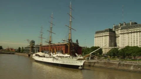 Old sailing ship in the harbour waters of Buenos Aires with city buildings Stock Footage 160280637