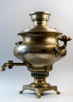 Old samovar on a white background Stock Photos