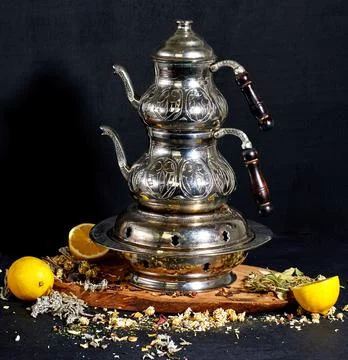 Old samover and herbs on the table. Stock-Fotos