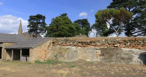 Old sandstone stables built by convicts at the town of Ross in Tasmania Stock Footage 160638512