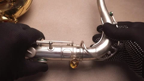 Old Saxophone in the Hands of a Master Stock Footage 295199856