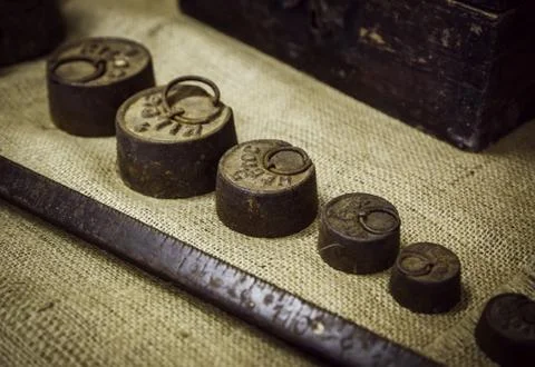 Old scale weights, average detail to control the weight Stock Photos