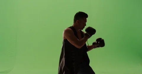 Old school boxer ready to fight throwing punches, jabs, hooks, Stock Footage 104303656