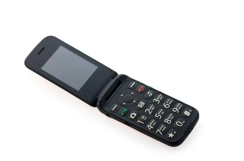Old school flip phone opened and ready for use with classic keys and a simp.. Stock Photos