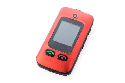 Old-school mobile phone showcasing a vibrant red design and simplistic feat.. Stock Photos