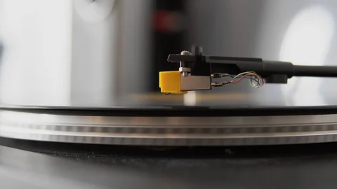 Old school record player. Close up vinyl record spinning. Needle playing vinyl Stock Footage 127302985