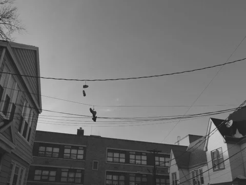 Old School Shoes On A Wire 스톡 동영상 73611369