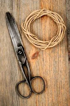 Old scissors and hank of packthread Stock Photos