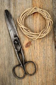 Old scissors and hank of packthread old scissors and hank of packthread on... Stock Photos