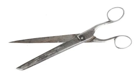 An old scissors isolated on a white background. Stock Photos