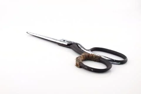 Old scissors on isolated white background. Stock Photos