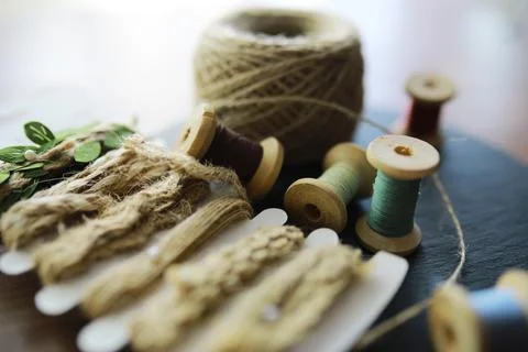 Old scissors, spools of colored thread, centimeter and tailors chalk, flat .. Stock Photos