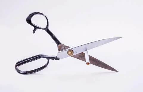 Old scissors used to cut cigarette to quit smoking Stock Photos