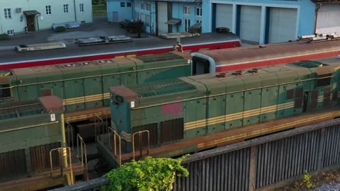 Old scrap damaged abandoned trains repair service station 6 Stock Footage 132391898