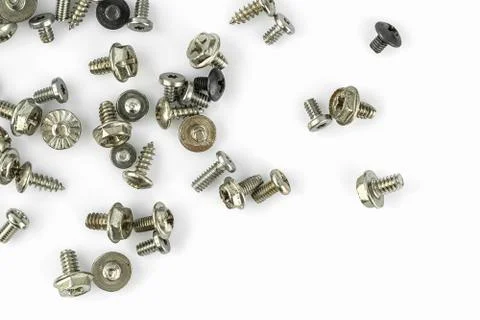 Old screws on the white background Stock Photos