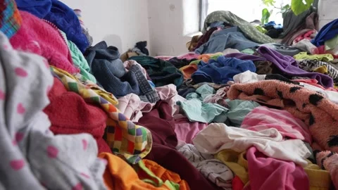 Old secondhand clothing. Textile and clothing industry waste Stock Footage 320520694