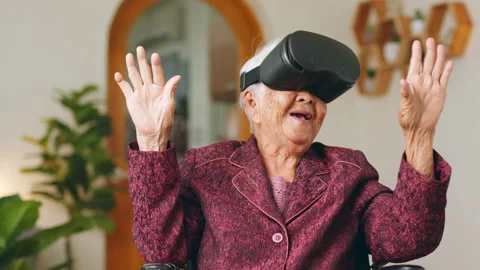 Old senior wearing vr headset feeling excited with reality world metaverse Stock Footage 189234797