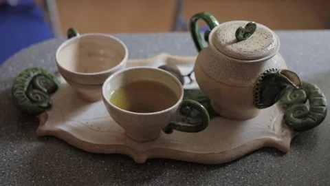 A old set of teapots and two cups 動画素材 85094177