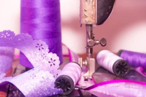 Old sewing machine and sewing elements Stock Photos