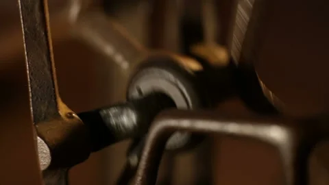 Old sewing machine close-up. Retro gear, belt drive, vintage wheels Stock Footage 114393150