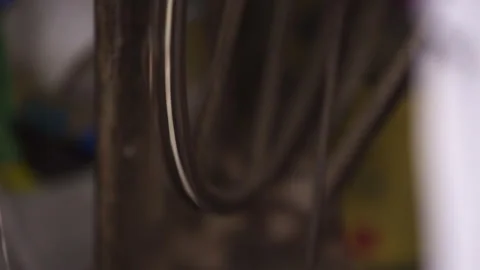 Old Sewing Machine Close-Up. Retro Gear, Belt Drive, Vintage Wheels Stock Footage 260721945