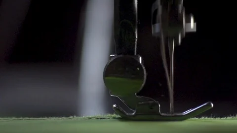 Old Sewing machine needle sewing Stock-Footage 128785589