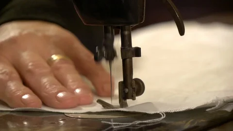 Old sewing machine at work Stock Footage 125949331